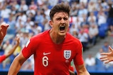 Harry Maguire celebrates goal for England against Sweden