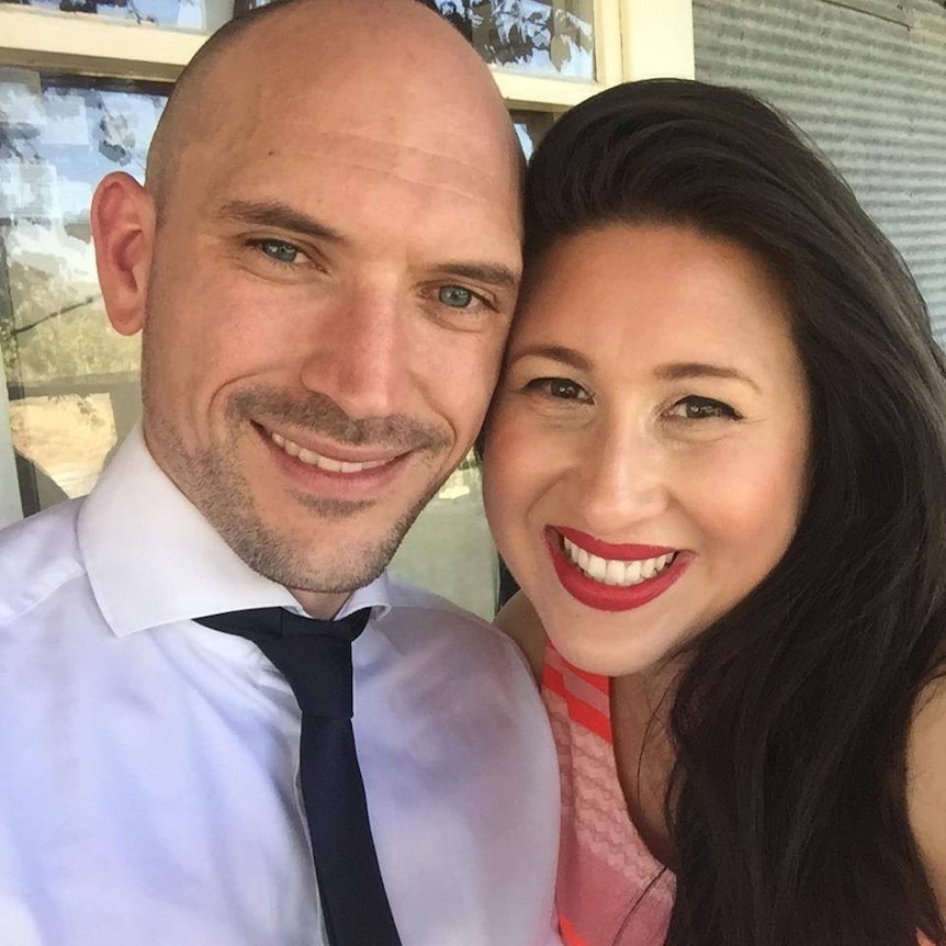 Selfie of Regina and her husband, expats who've lived in both Melbourne and Vienna.