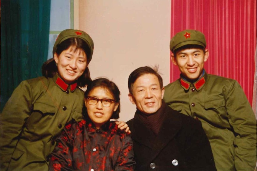 Xiaoming Li with his parents, who were both intellectuals in China, and his sister, who was also a soldier, in 1984.