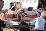 Injured asylum seekers are being treated in Perth, Darwin and Brisbane hospitals.