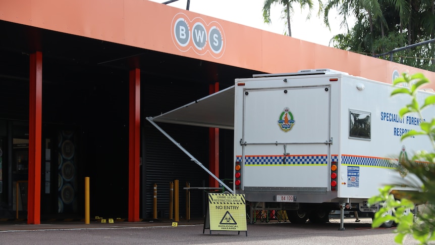 A NT Police forensics van parked out the front of a BWS store.