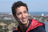 Ricciardo poses in front of Albert Park