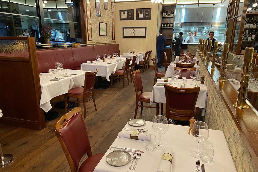 Restaurant tables rearranged for social distancing rules.