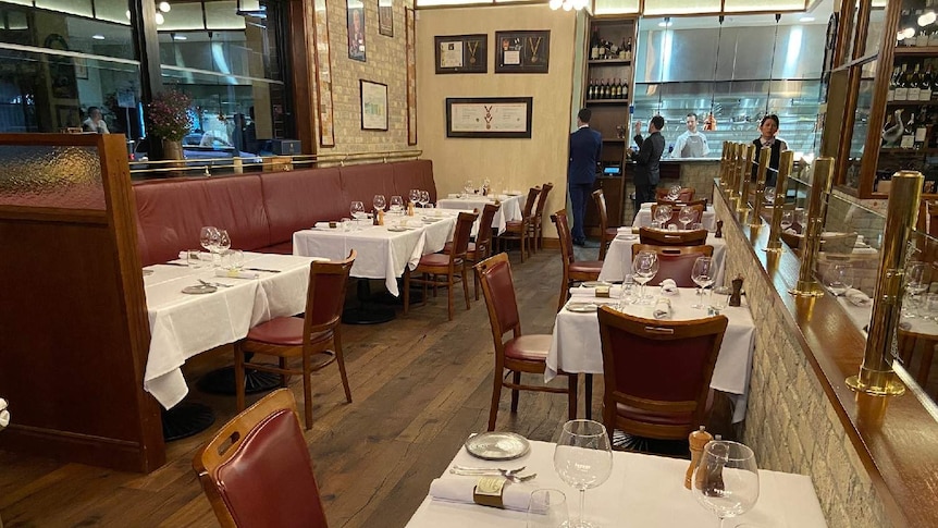 Restaurant tables rearranged for social distancing rules.