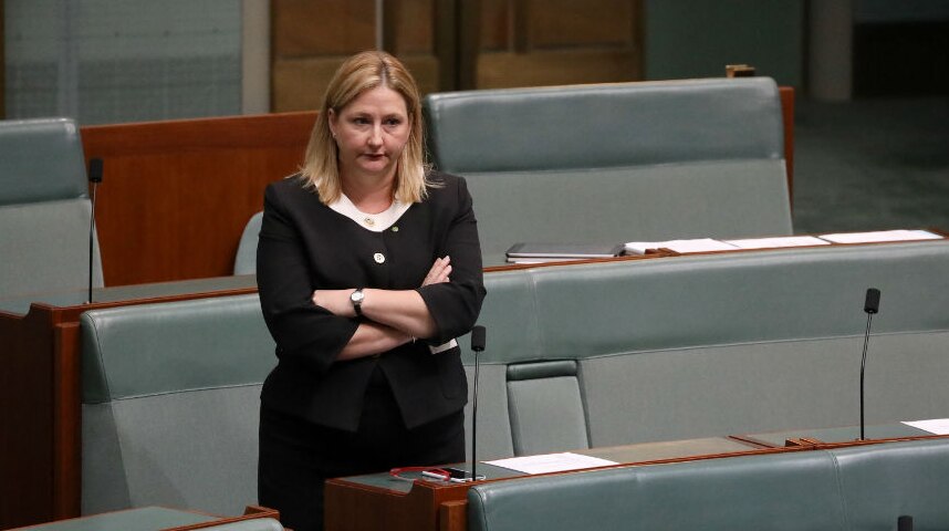 Rebekha Sharkie stands and crosses her arms in Parliament.