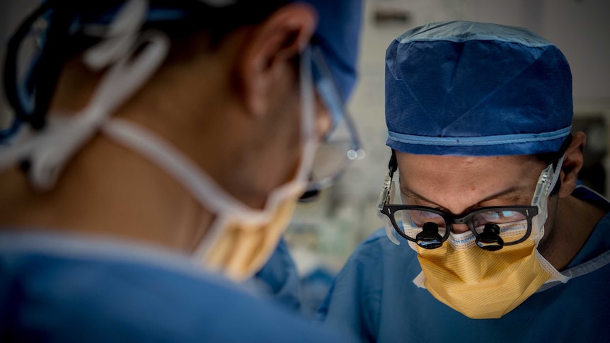 A surgeon concentrating during an operation at St Vincent's Hospital