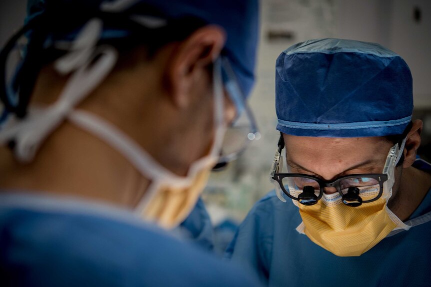 A surgeon concentrating during an operation at St Vincent's Hospital