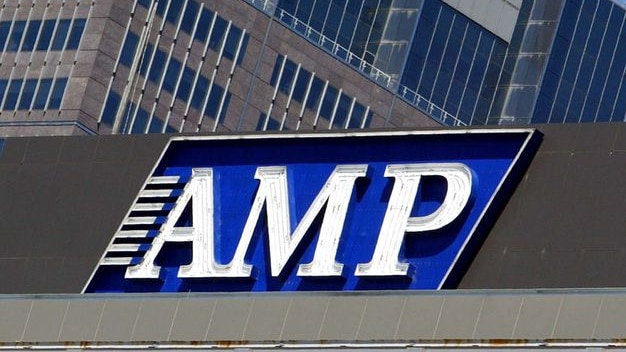 An AMP sign is displayed on a building in the Sydney central business district.