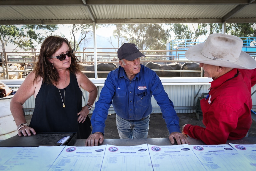 Ron Woodall (centre) with his daughter Tania who also works at the rodeo taking all bookings.