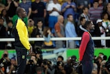 Usain Bolt receives his gold medal at the Olympics