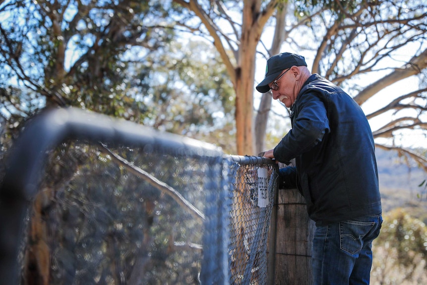 Ross McKinney opens a gate on the way in to the Kosciusko National Park.