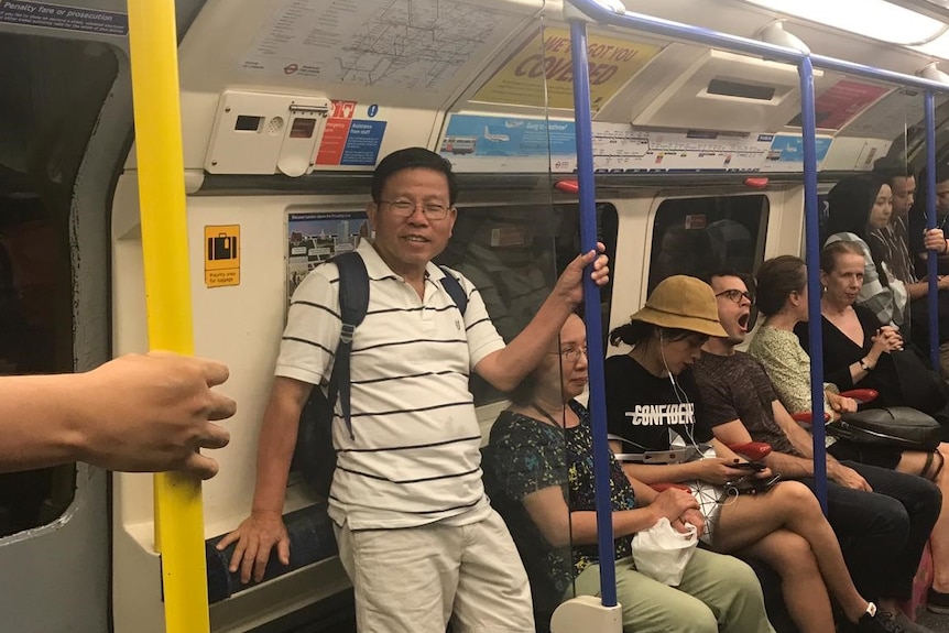 Chau Van Kham rides the London Underground during a visit to the UK last year.