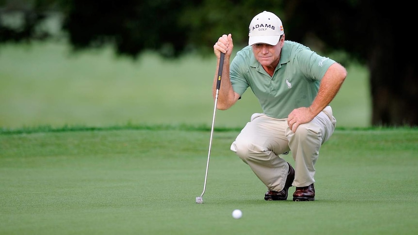 Golfing great Tom Watson uses a traditional putter at the Senior Players Championship in 2011.