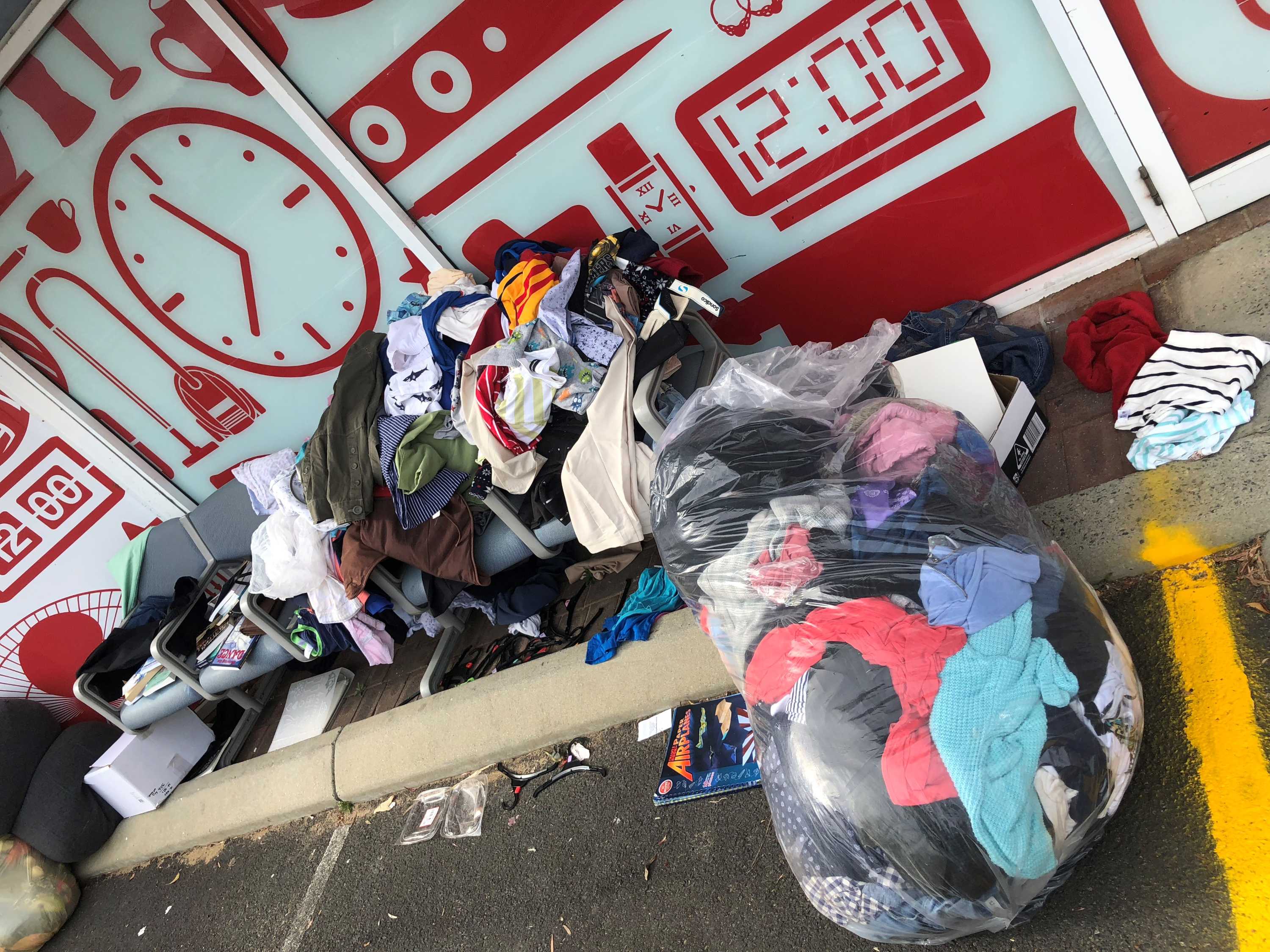 Clothes rotting in carpark