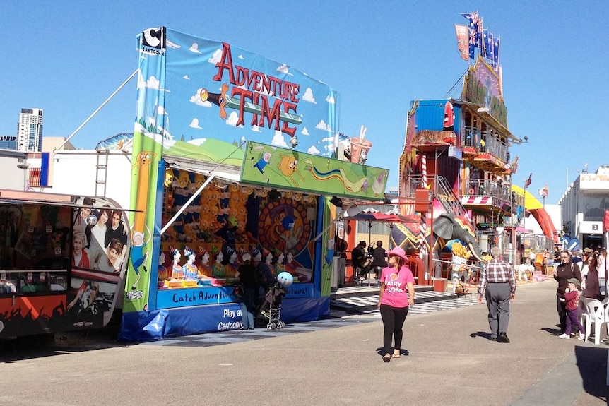 Spruikers in Sideshow Alley at Brisbane's Ekka try and grab people's attention during the show.