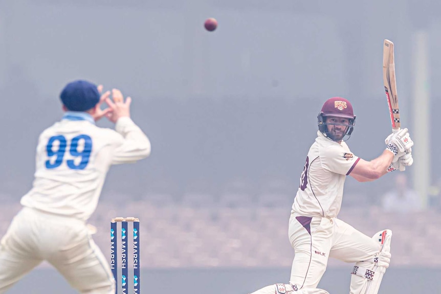 Number 99 for the NSW Sheffield Shield side moves to catch out Queensland batsman Michael Neser.