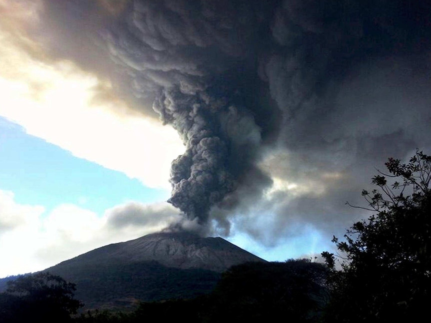 Chaparrastique volcano spews ash and smoke.