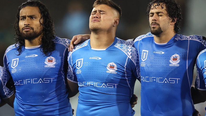 A man is brought to tears during the Samoan national anthem before a rugby league test