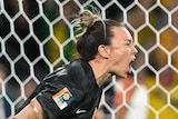 Australian goalie Mackenzie Arnold celebrates during penalty shootout against France in Women's World Cup 