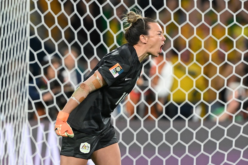 Australian goalie Mackenzie Arnold celebrates during penalty shootout against France in Women's World Cup 