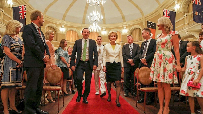 Mark McGowan walking with Kerry Sanderson inside Government House.