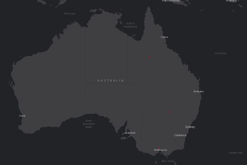 A black and grey map of Australia with three red dots in the centre of Queensland, NSW and Victoria.