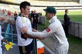 Graeme Smith and Michael Clarke shake hands after a drawn first Test