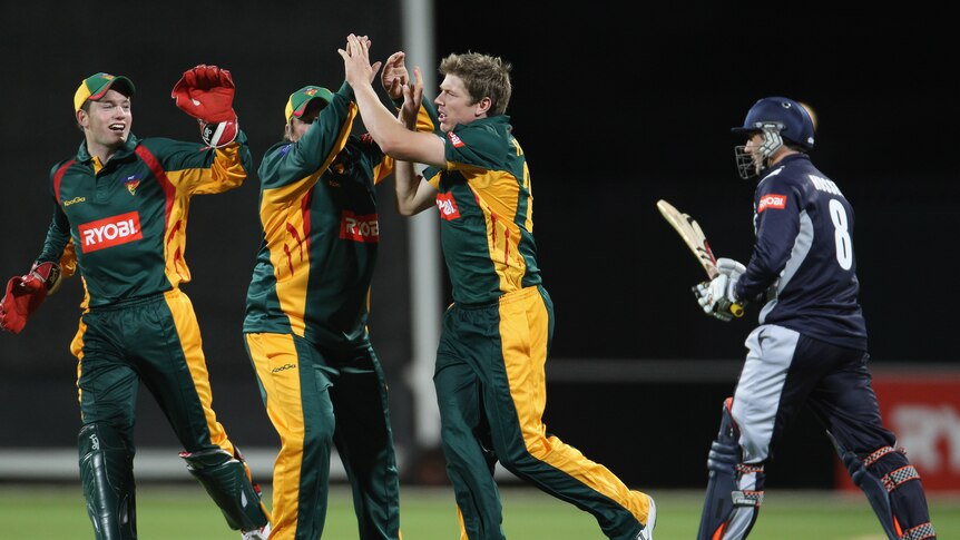 Key dismissal ... The Tigers celebrate the wicket of David Hussey (Robert Cianflone: Getty Images)