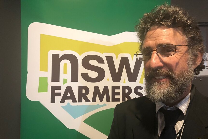 James Jackson, president of the NSW Farmers Association, pictured in front of the Associations banner.