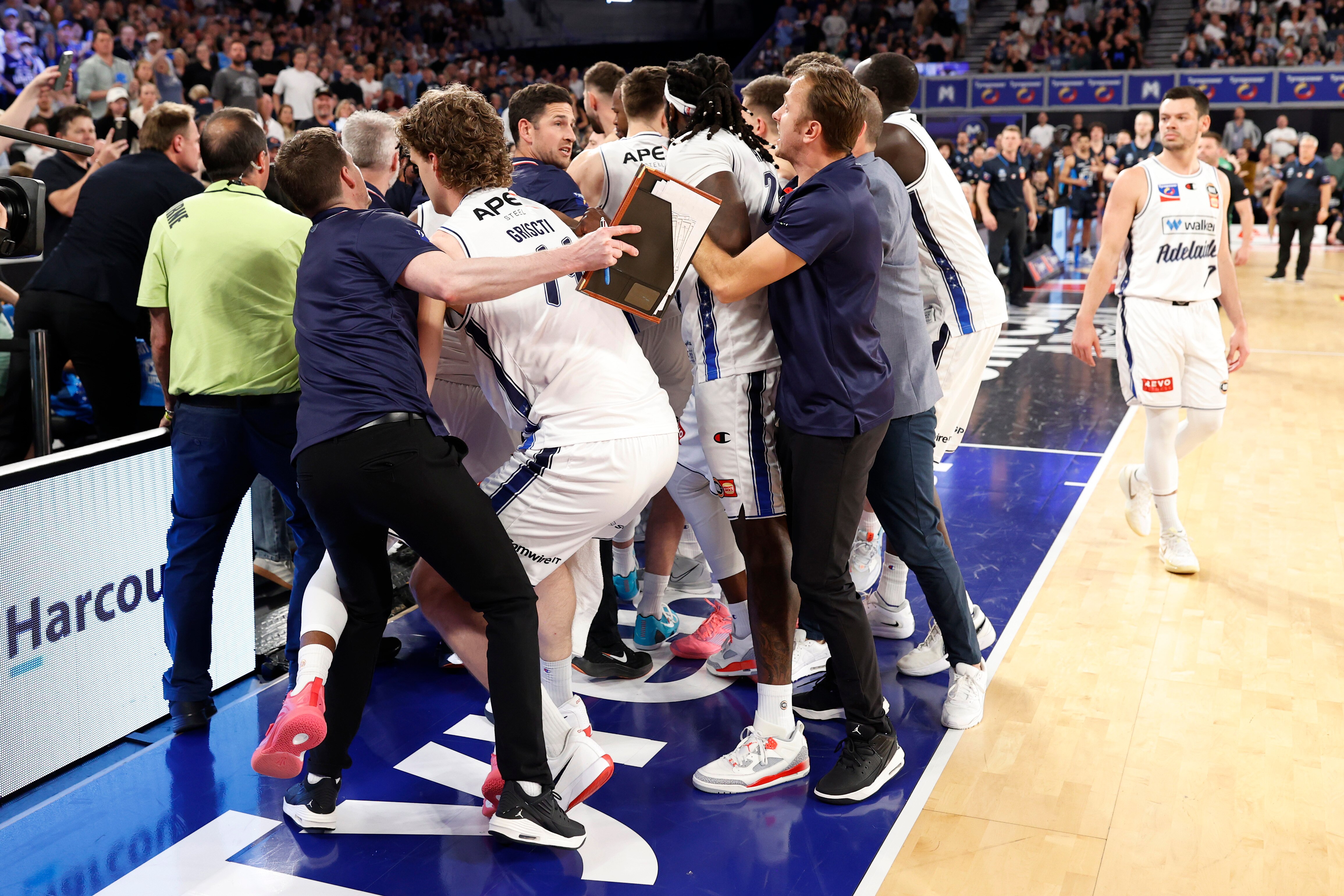 A fight breaks out on the bench