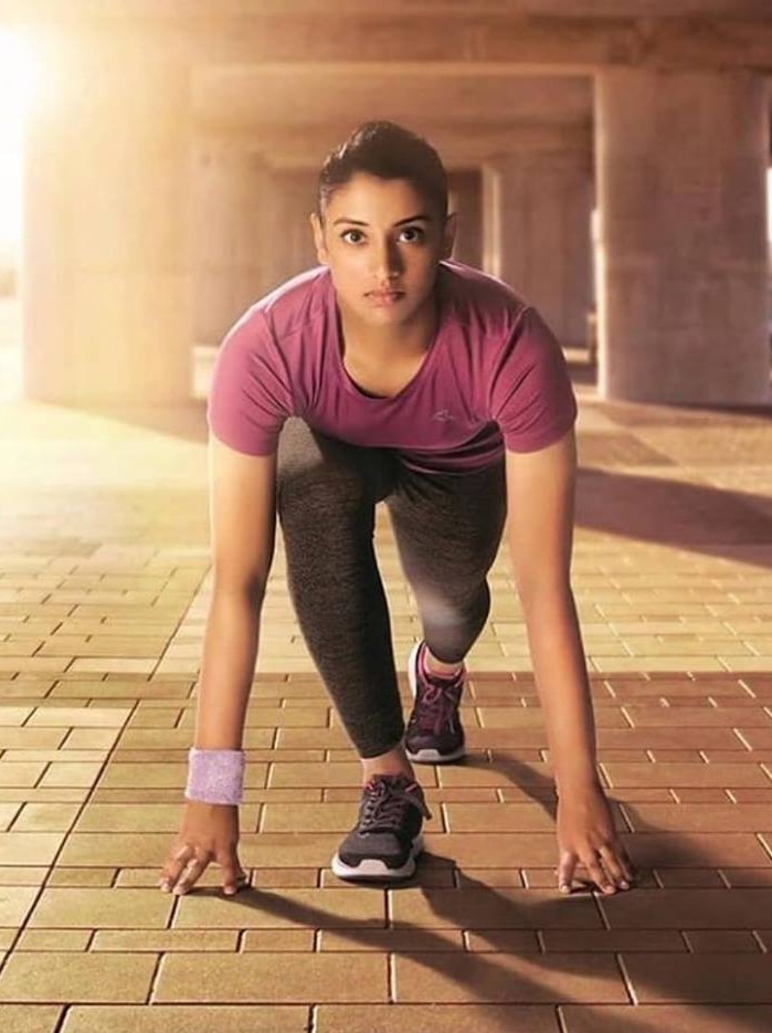 Indian cricketer Smriti Mandhana poses for photo in running gear.