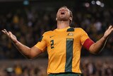 Lucas Neill scores his first ever goal for the Socceroos in the win over Jordan.