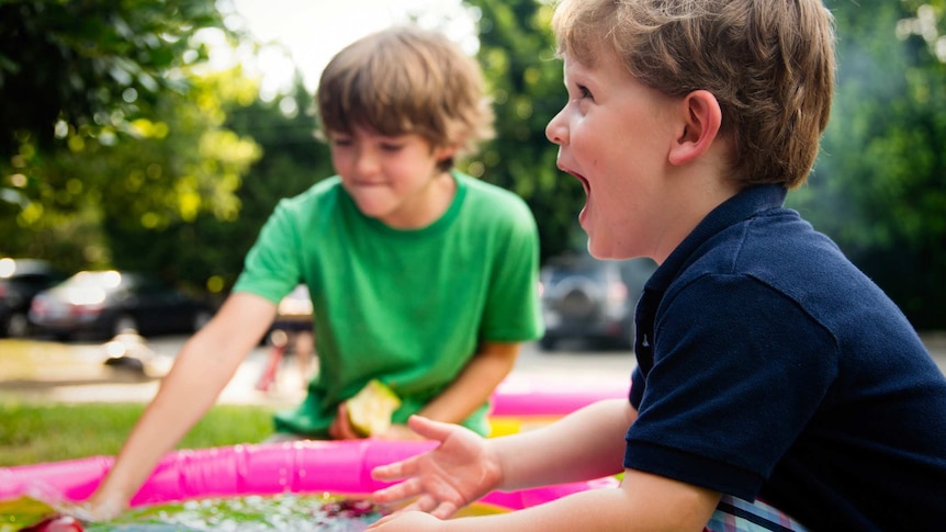 Two children in a playground.