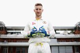 Australian wicketkeeper Peter Nevill poses at Lord's cricket ground