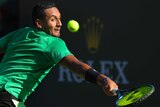 Australia's Nick Kyrgios returns a shot to Serbia's Novak Djokovic at the Indian Wells tournament.