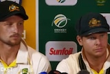 Cameron Bancroft and Steve Smith giving a press conference.