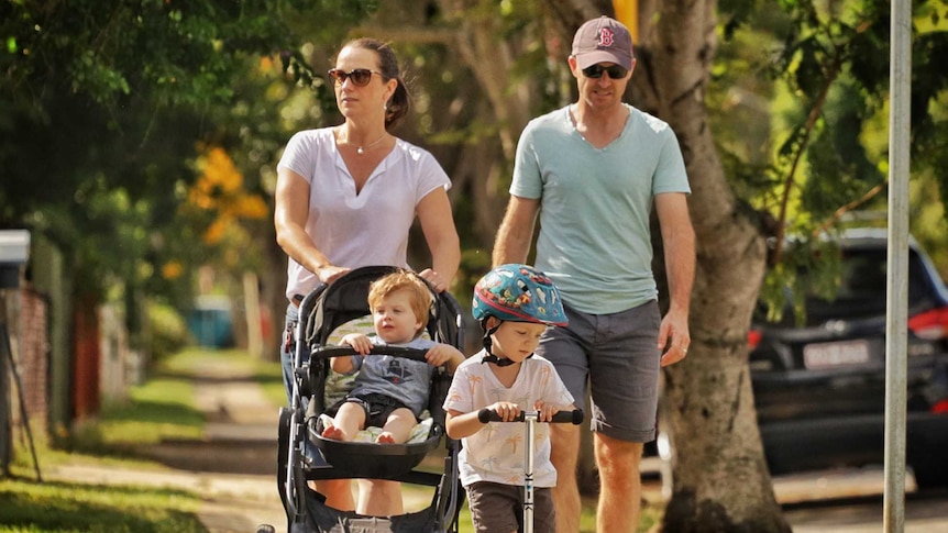 Brianna and John Arrigo with their children.