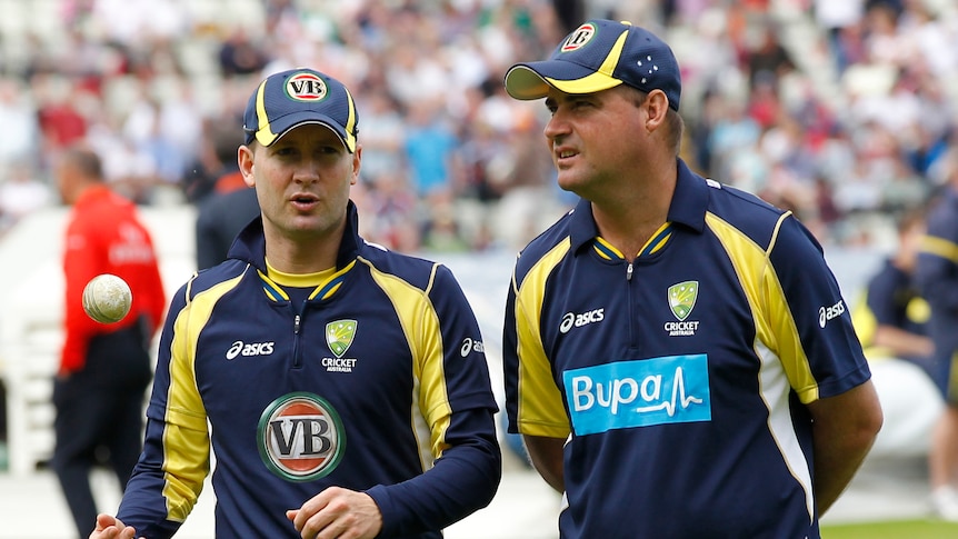 Captain Michael Clarke and coach Mickey Arthurs talk during an ODI against England.