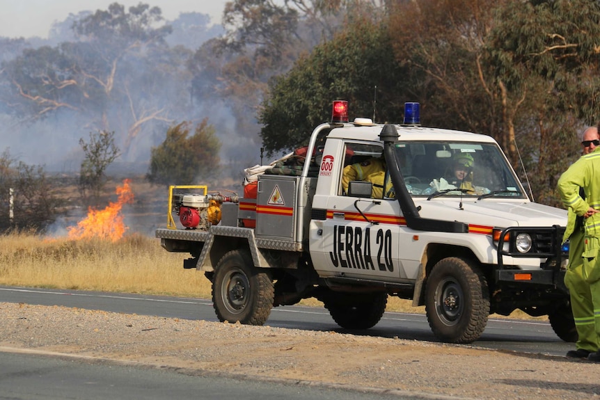 Firefighters at a grassfire in Pialligo near the ACT and NSW border. January 22, 2020.