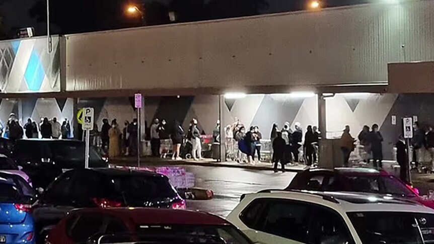 Queues at midnight outside Kmart stores as eager customers shop 'til they drop 