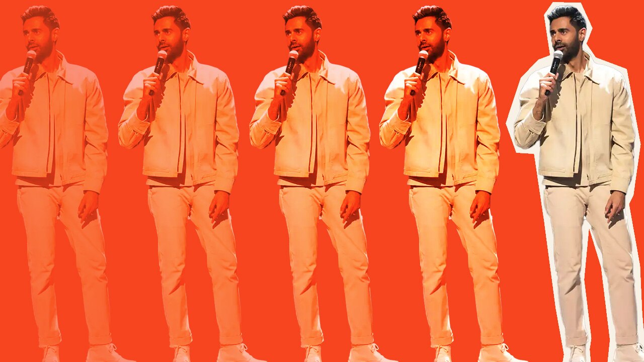 Hasan Minhaj on an orange background, slowly fading into (or out of?) relevance. 