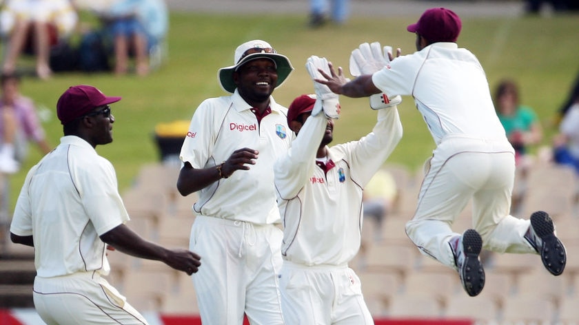 Adrian Barath celebrates after catching Simon Katich out for 21 in the covers.