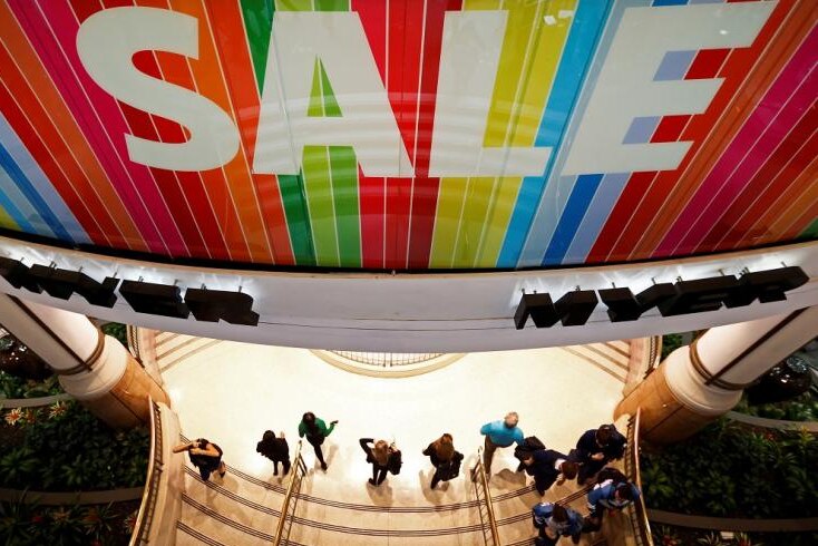Customers arriving for a sale at a department store in a shopping mall in central Sydney