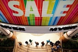 A file photo of customers arriving for a sale at a department store in a shopping mall in central Sydney