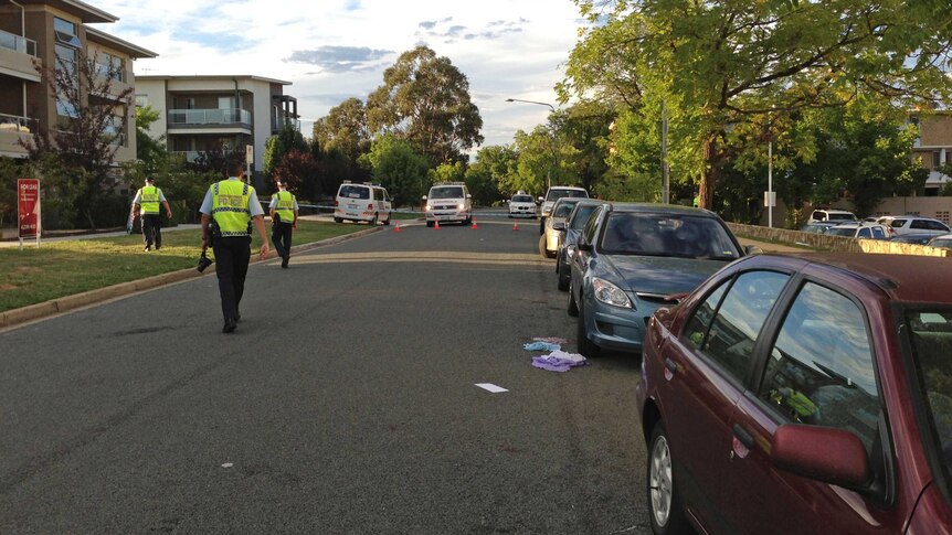Officers at the scene of an early morning hit and run accident at Braddon.