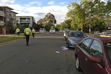 Officers at the scene of an early morning hit and run accident at Braddon.