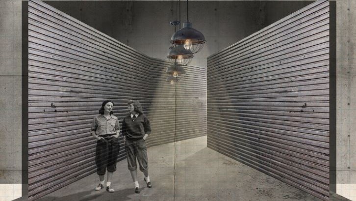 You view a CAD rendering of two women walking through an underground bunker tunnel.