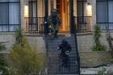 Bomb squad searches Melbourne home