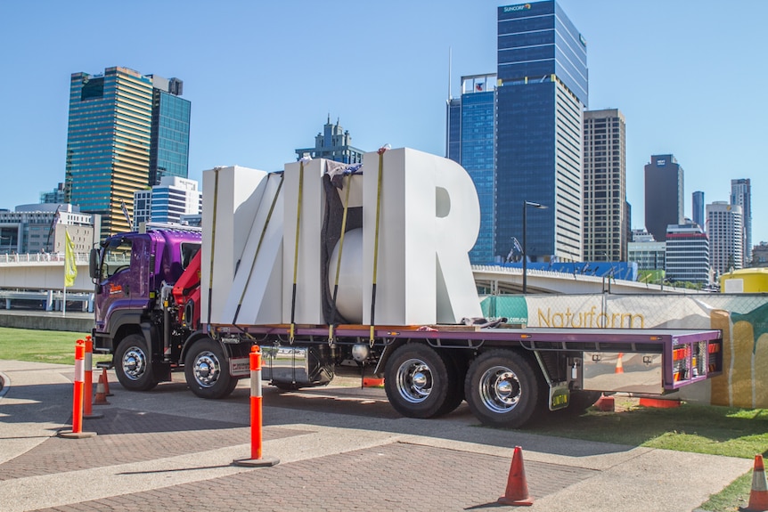 A truck carrying all the letters of the Brisbane sign to be installed at South Bank.
