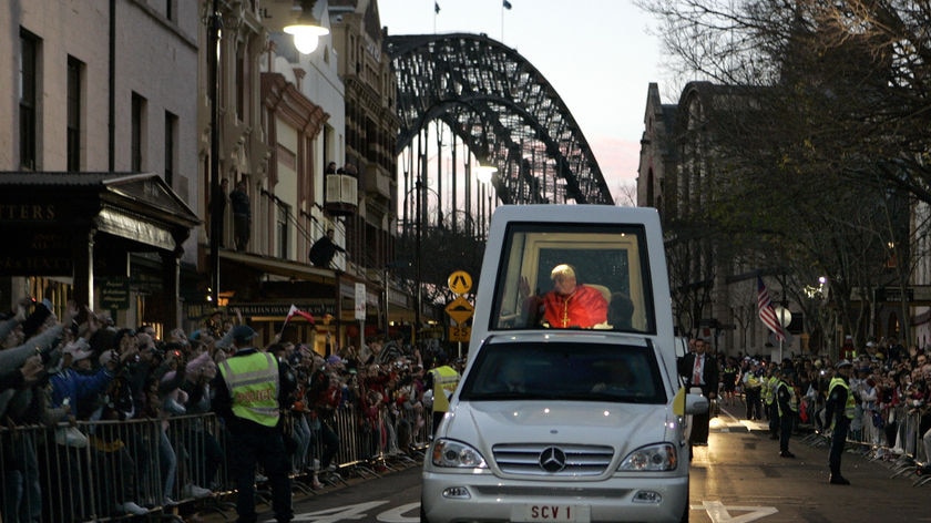 The Popemobile drives through Sydney